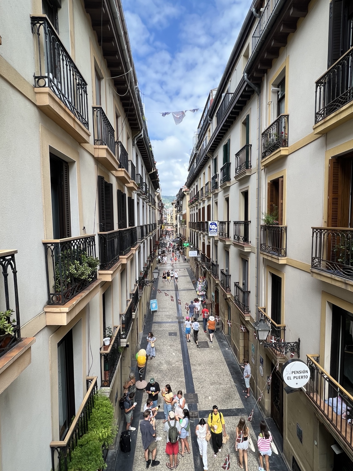 A sunlit street in San Sebastián's Old Town
